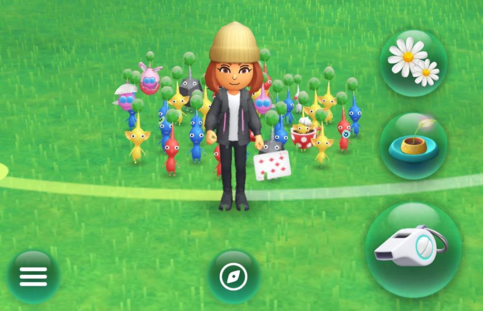 Le Mii de l'auteur illustré dans une capture d'écran de Pikmin Bloom, avec un groupe de Pikmin debout autour de lui