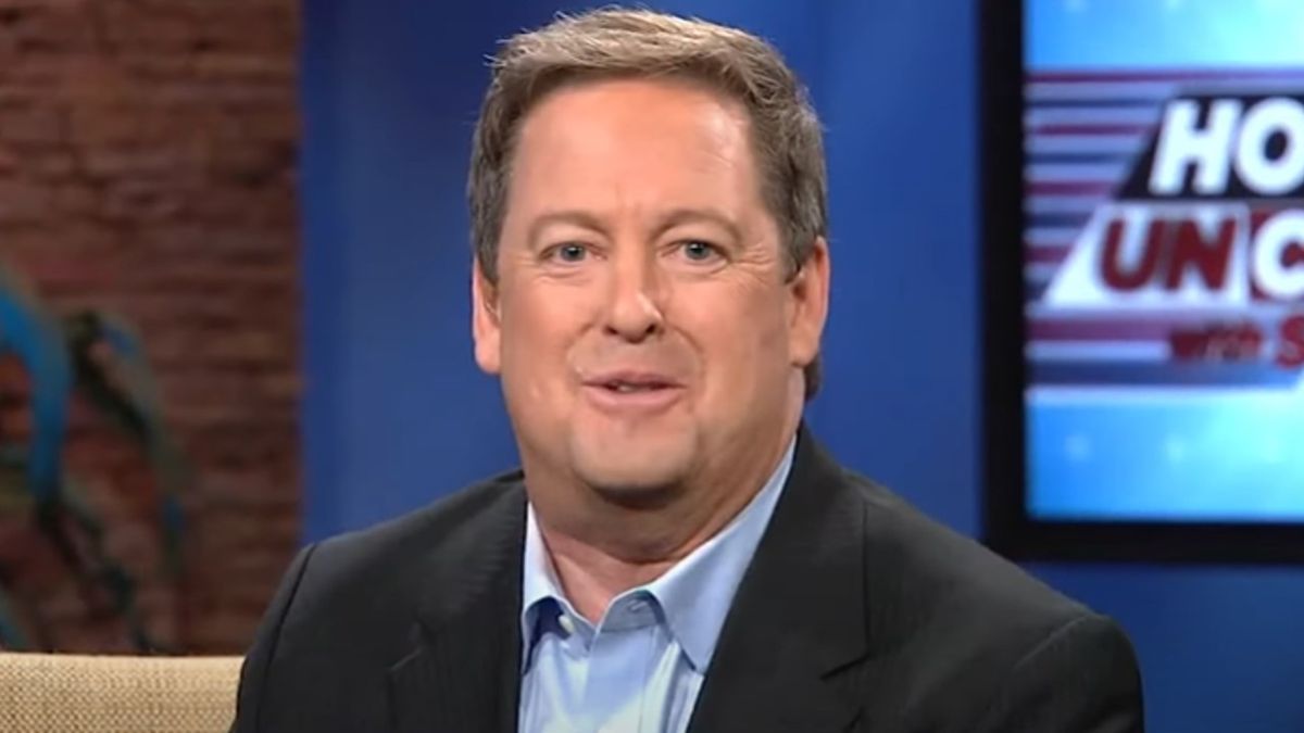 Sam Rubin smiling while talking during a KTLA broadcast.