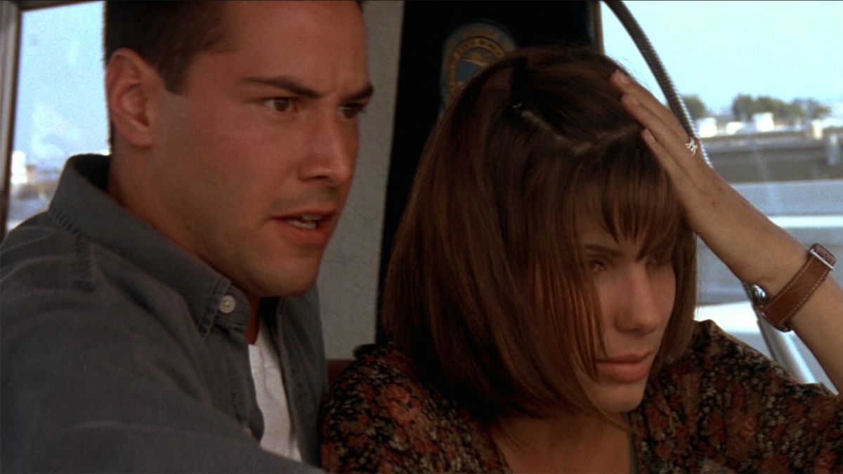 Keanu Reeves and Sandra Bullock post jump in Speed