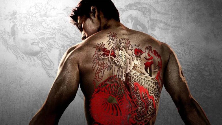 A man standing with his back to camera with a red and black dragon tattoo on his back.