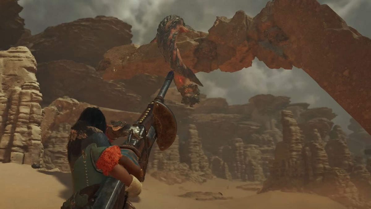 Le joueur pointe son fusarbalète lourd sur un monstre dans Monster Hunter Wilds.