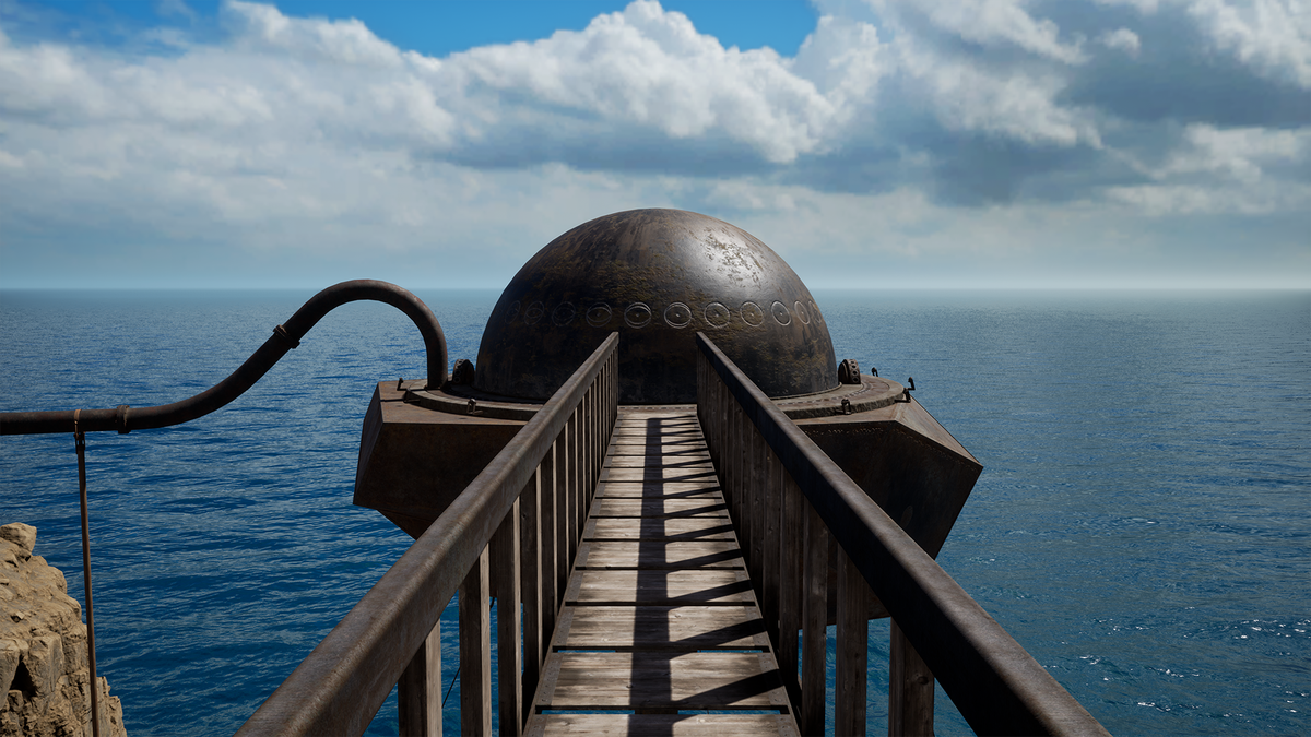 Un pont menant à un dôme en métal sombre orné d'un motif de sceaux ronds.  En arrière-plan se trouve un horizon de mer sans fin, de ciel bleu et de nuages ​​​​duveteux dans Riven (2024). 