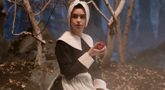 Lily Collins holding apple in nun outfit in Maxxxine