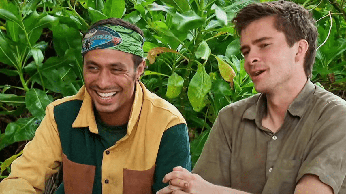 Ben And Charlie laugh while trying to name songs by their favorite artists on Survivor.