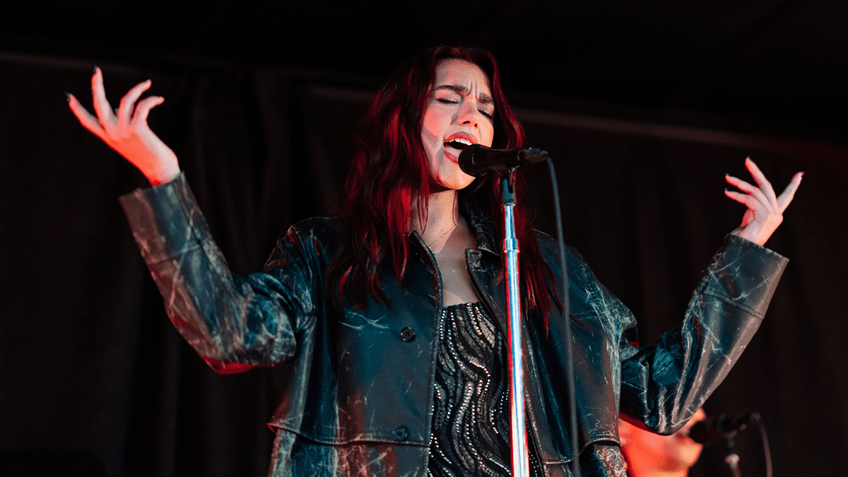 Dua Lipa performs suring a surprise pop-up for her new album Radical Optimism in Times Square