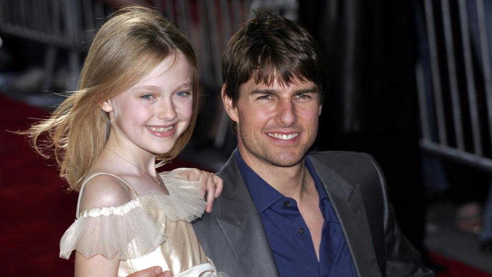 Dakota Fanning révèle le cadeau d'anniversaire que Tom Cruise lui offre chaque année depuis 