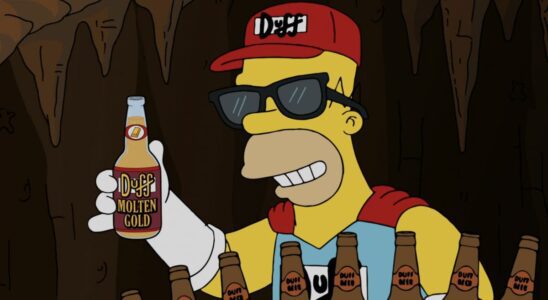 Homer Simpson dressed as Duff Man wearing a Duff hat and costume while holding a Duff Molten Gold bottle on The Simpsons.