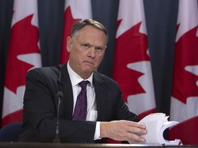 David McGuinty, président du Comité parlementaire sur la sécurité nationale et le renseignement, tient une conférence de presse à Ottawa, le jeudi 12 mars 2020.