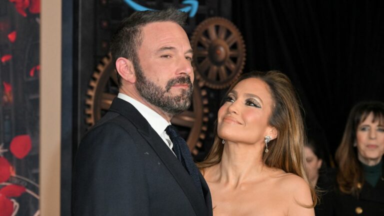 JLo smiling at Affleck at the premiere of This is Me... Now: A Love Story