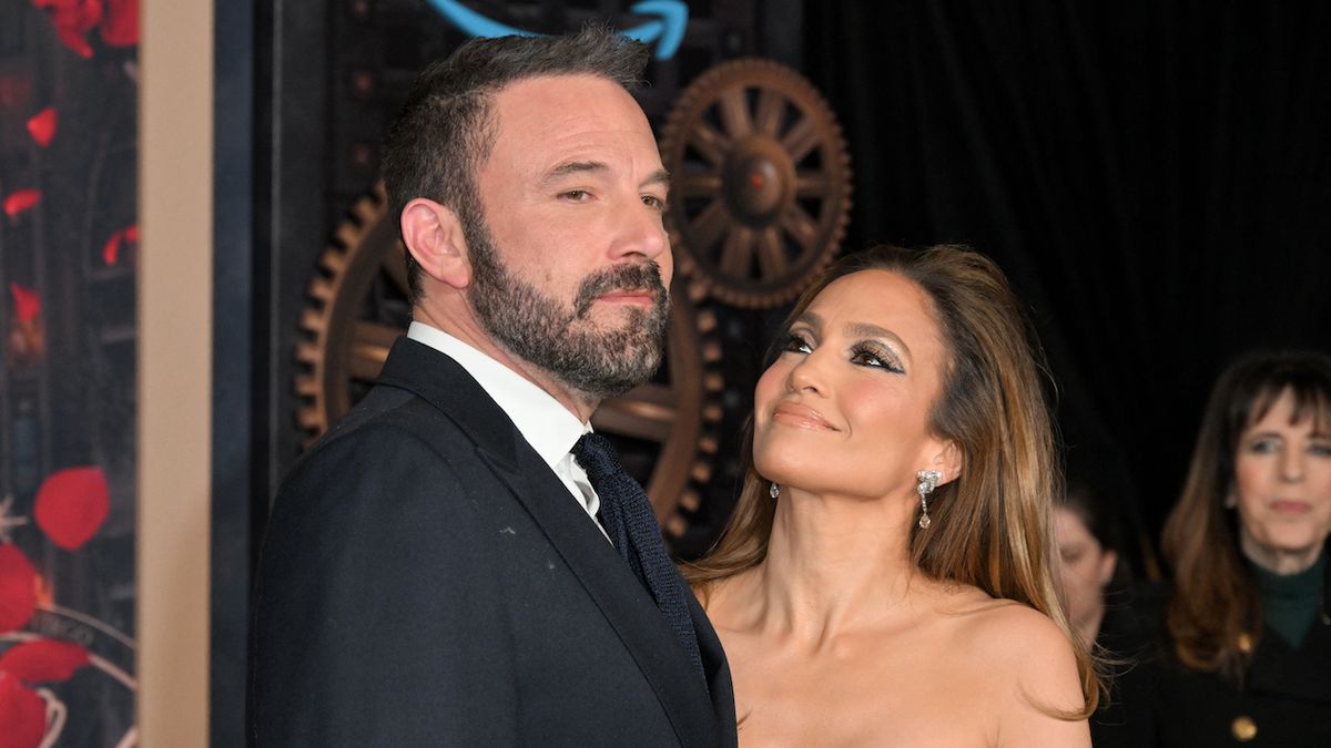 JLo smiling at Affleck at the premiere of This is Me... Now: A Love Story