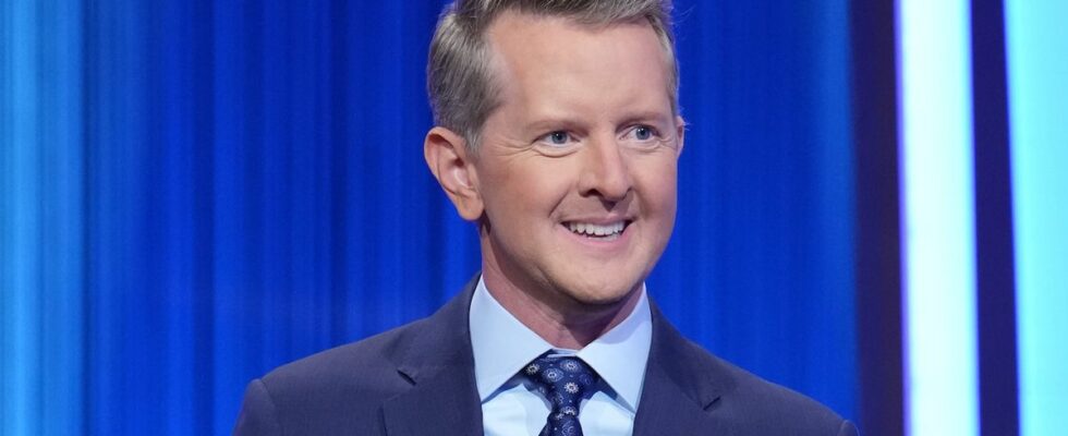 Ken Jennings in navy jacket hosting Celebrity Jeopardy