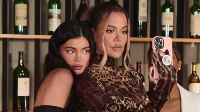 Kylie Jenner and Khloe Kardashian pose for a selfie during an episode of The Kardashians.