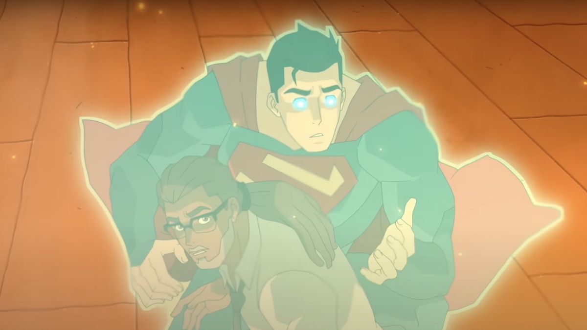 Superman emitting an energy aura protecting him and Silas Stone in burning apartment