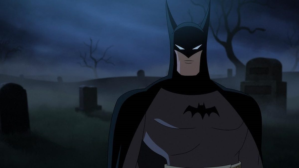 Batman standing in a graveyard in Batman: Caped Crusader