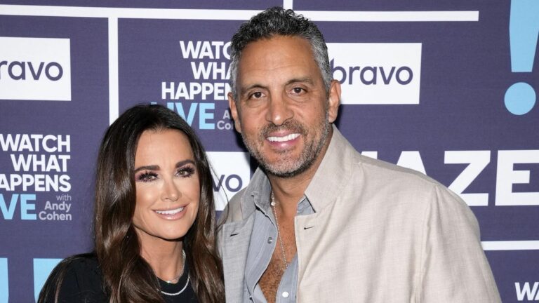 Kyle Richards and Mauricio posing together at WWHL