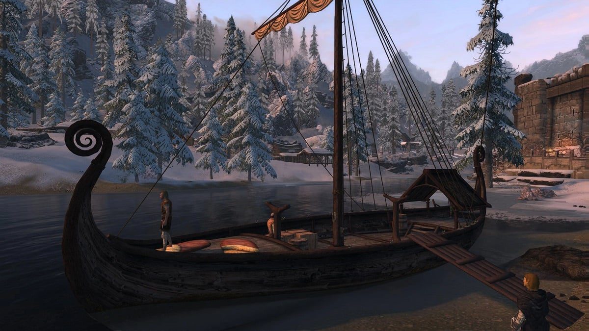 Skyrim: a wooden Biking-style boat sits at a snowy dock.