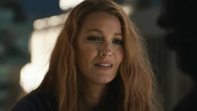 A close up of Blake Lively kind of smiling in It Ends With Us.