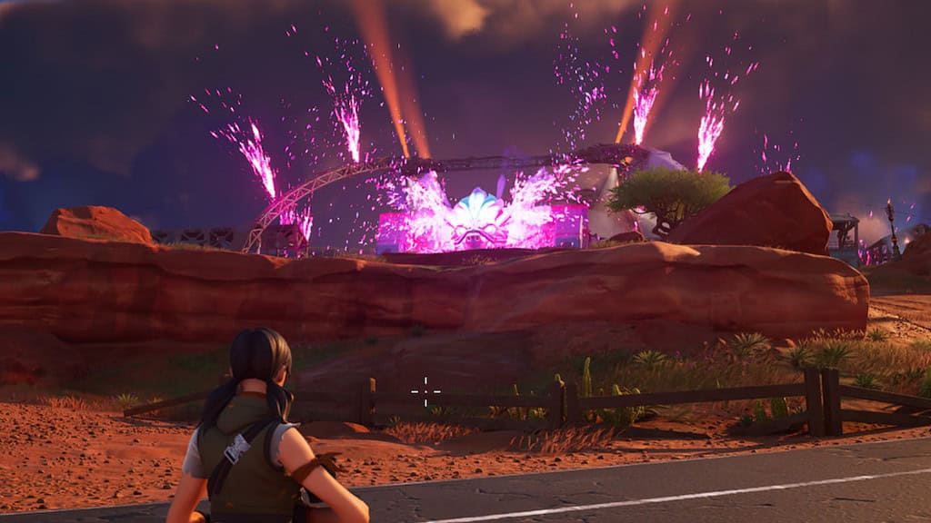 Un joueur de Fortnite regarde des feux d'artifice au-dessus du Nitrodome