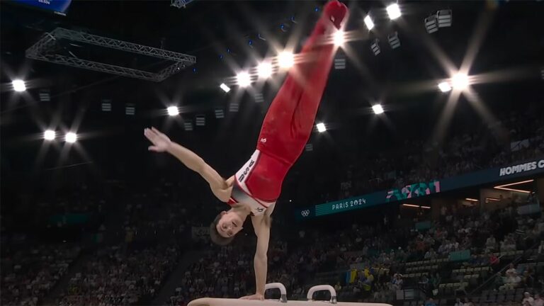 Stephen Nedoroscik goes full Superman during pommel horse finals at the 2024 Olympics.