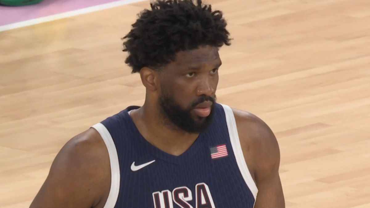 Joel Embiid prepares for the tip off against Serbia at the Olympics.