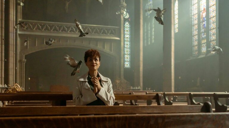 Nathalie Emmanuel with birds in The Killer