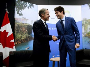 Le Premier ministre Justin Trudeau rencontre le gouverneur de la Banque d'Angleterre, Mark Carney, lors du sommet du G20 à Buenos Aires, en Argentine, le vendredi 30 novembre 2018.