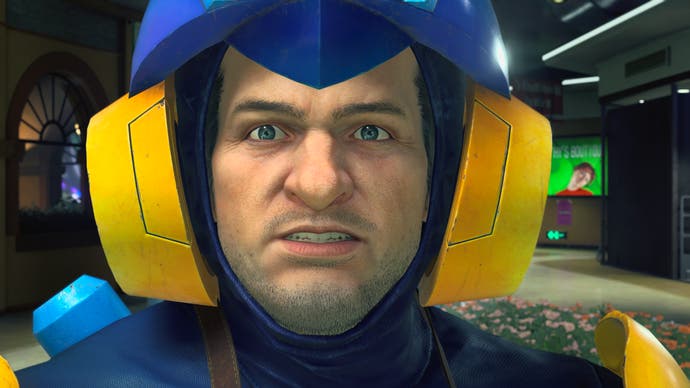 Frank, déguisé en Mega Man, a l'air choqué dans une cinématique de Dead Rising Deluxe Remaster.