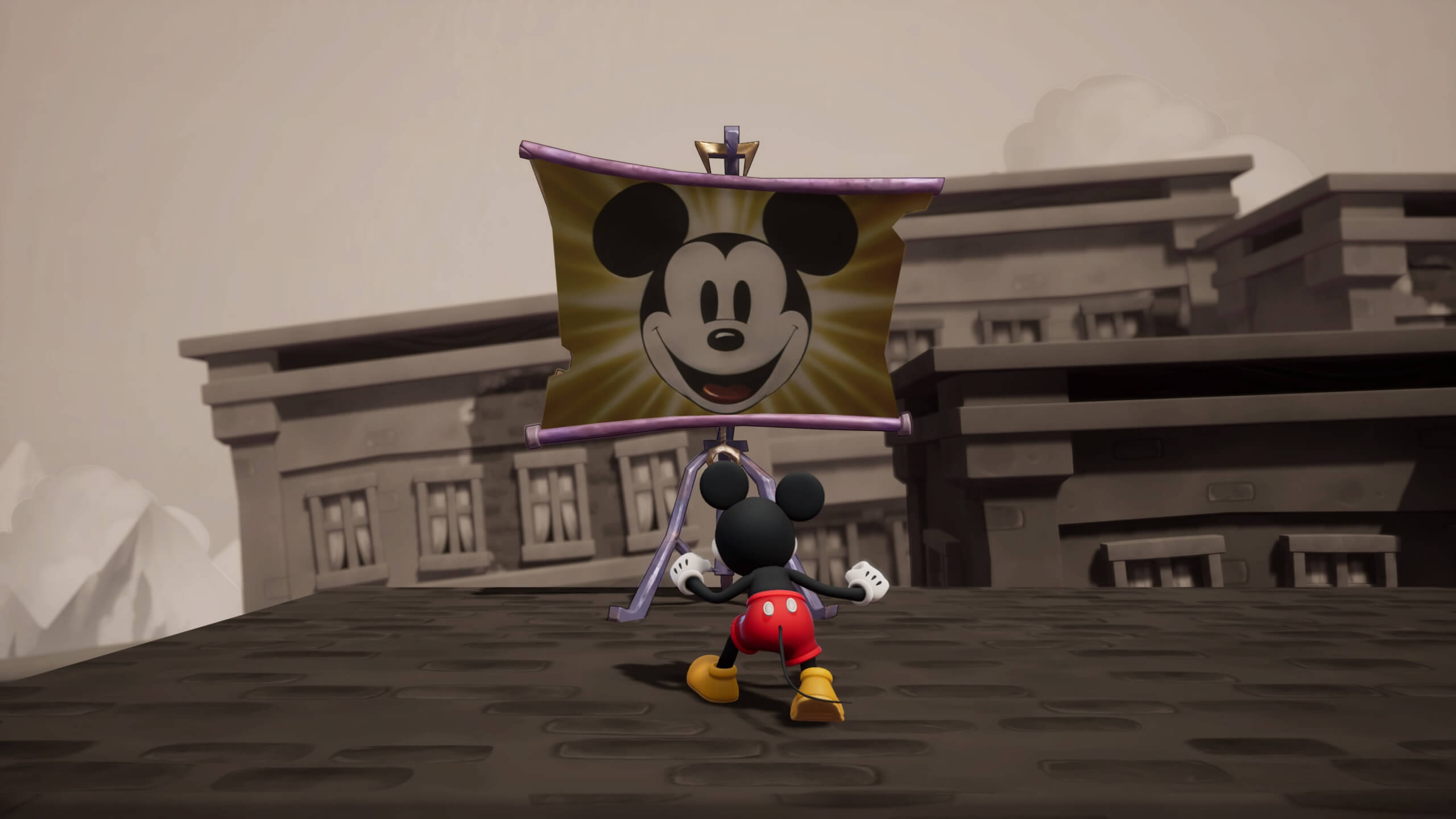 un plan de Mickey sur le point de sauter dans un projecteur. Le projecteur lui-même porte également son image. 