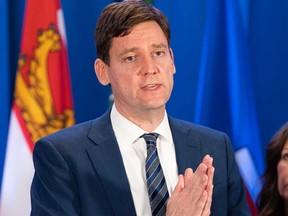 Le premier ministre de la Colombie-Britannique, David Eby, s'adresse aux journalistes lors de réunions avec les autres premiers ministres du Canada lors des réunions du Conseil de la fédération à Halifax, le mardi 16 juillet 2024.