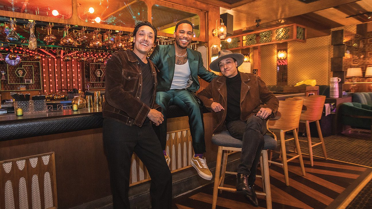 Anderson .Paak flanked by Mark Houston (left) and Jonnie Houston, founding partners of Andy’s, serving sick beats and craft cocktails.