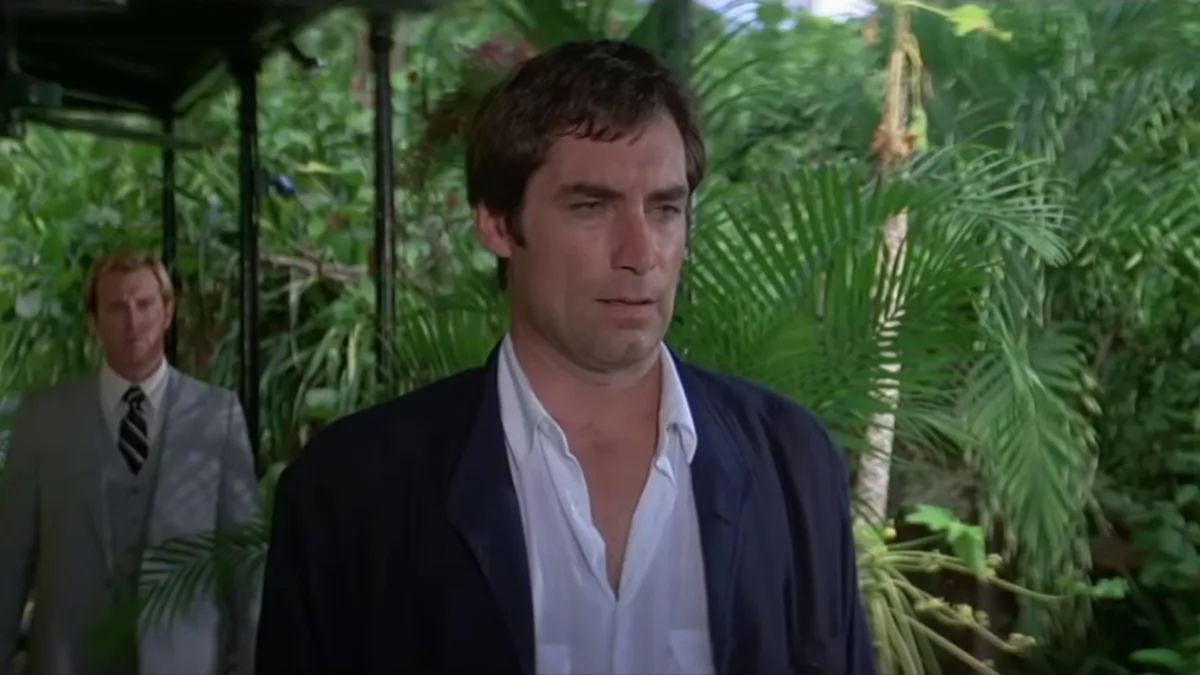 Timothy Dalton stands at Hemingway House, looking annoyed in Licence To Kill. 