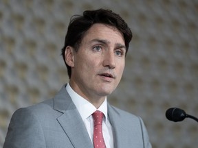 Le premier ministre Justin Trudeau répond à une question lors d'une conférence de presse à Vientiane, au Laos, le vendredi 11 octobre 2024.