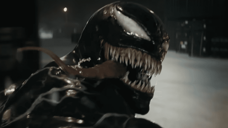 Venom looking back with his tongue hanging out while on a motorcyle in Venom: The Last Dance trailer